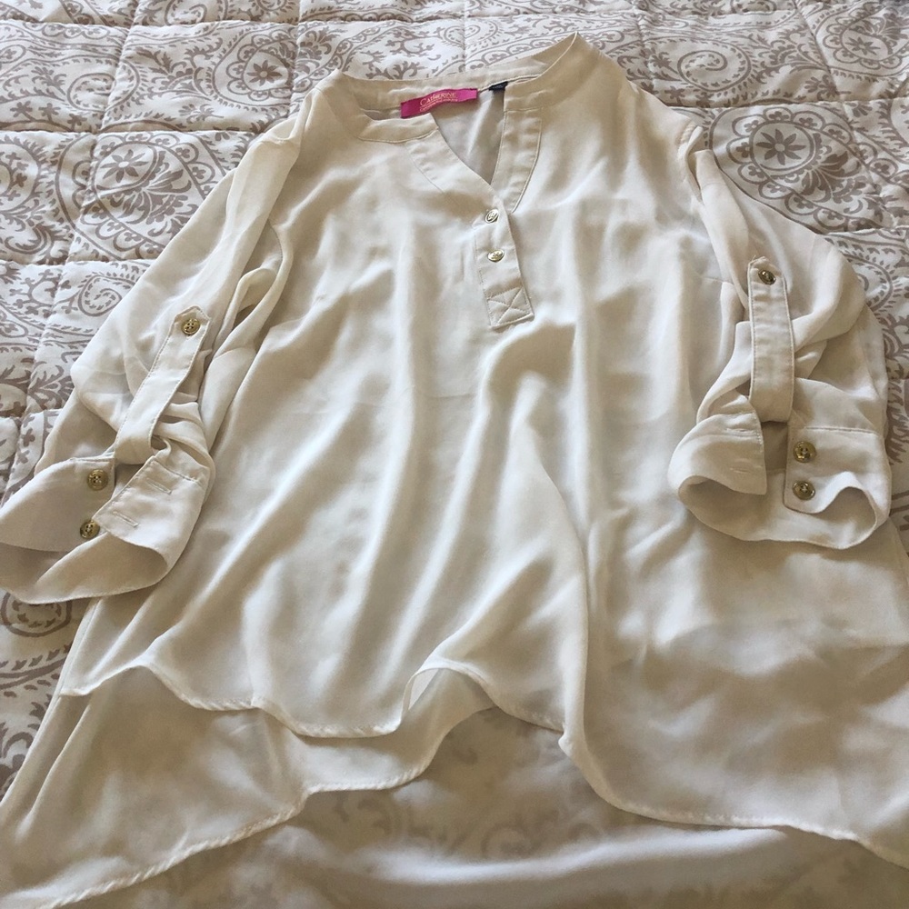 White blouse with golden buttons